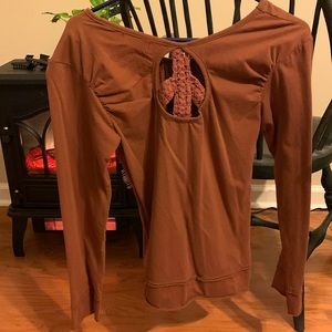 A Knit Peace Sign In The Back Top